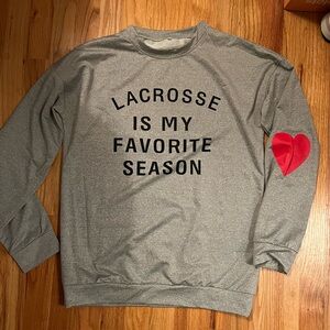 Women’s lacrosse light weight grey sweatshirt size medium.